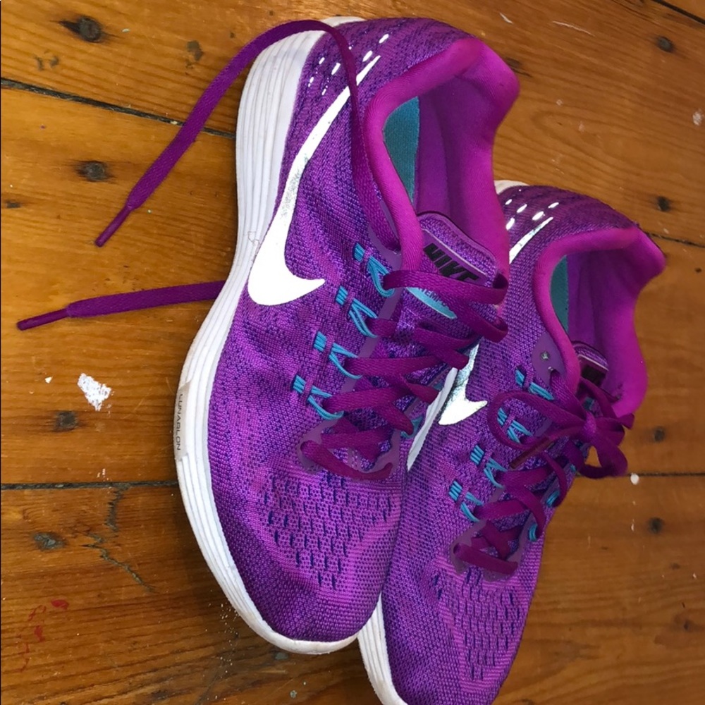 Purple Nike running sneakers